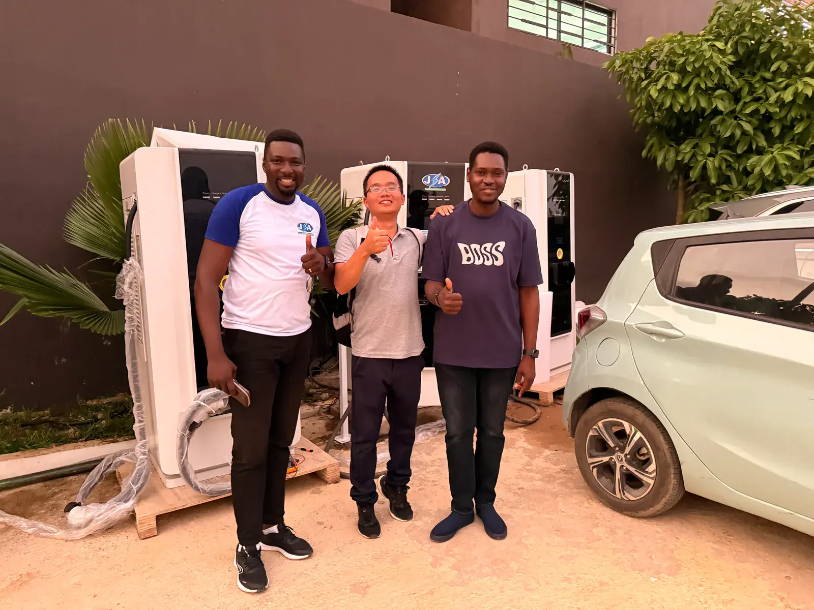 Customer handover record beside delivered EV charging equipment